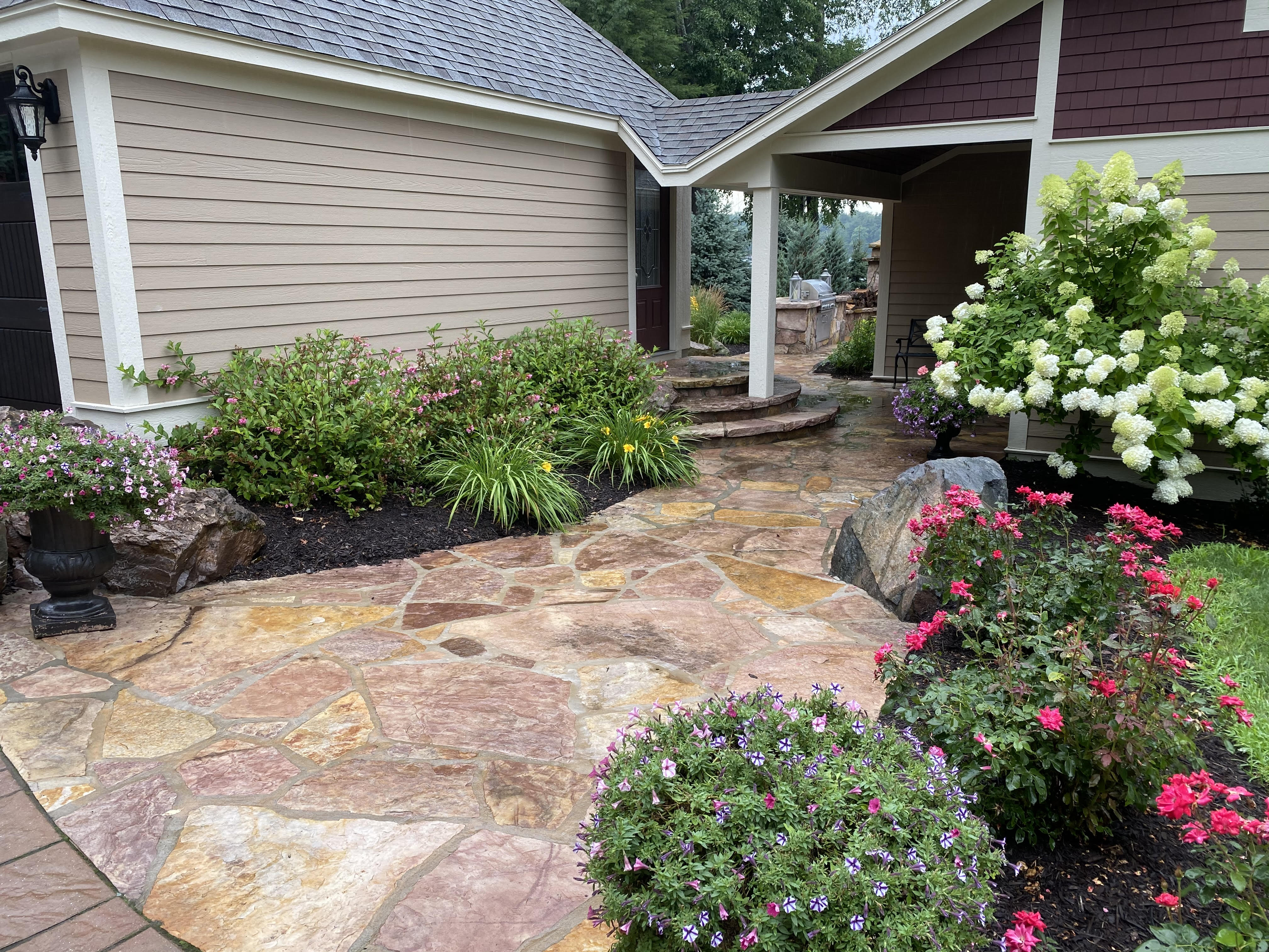 Flagstone Walkway and Entry with Foundation Plantings