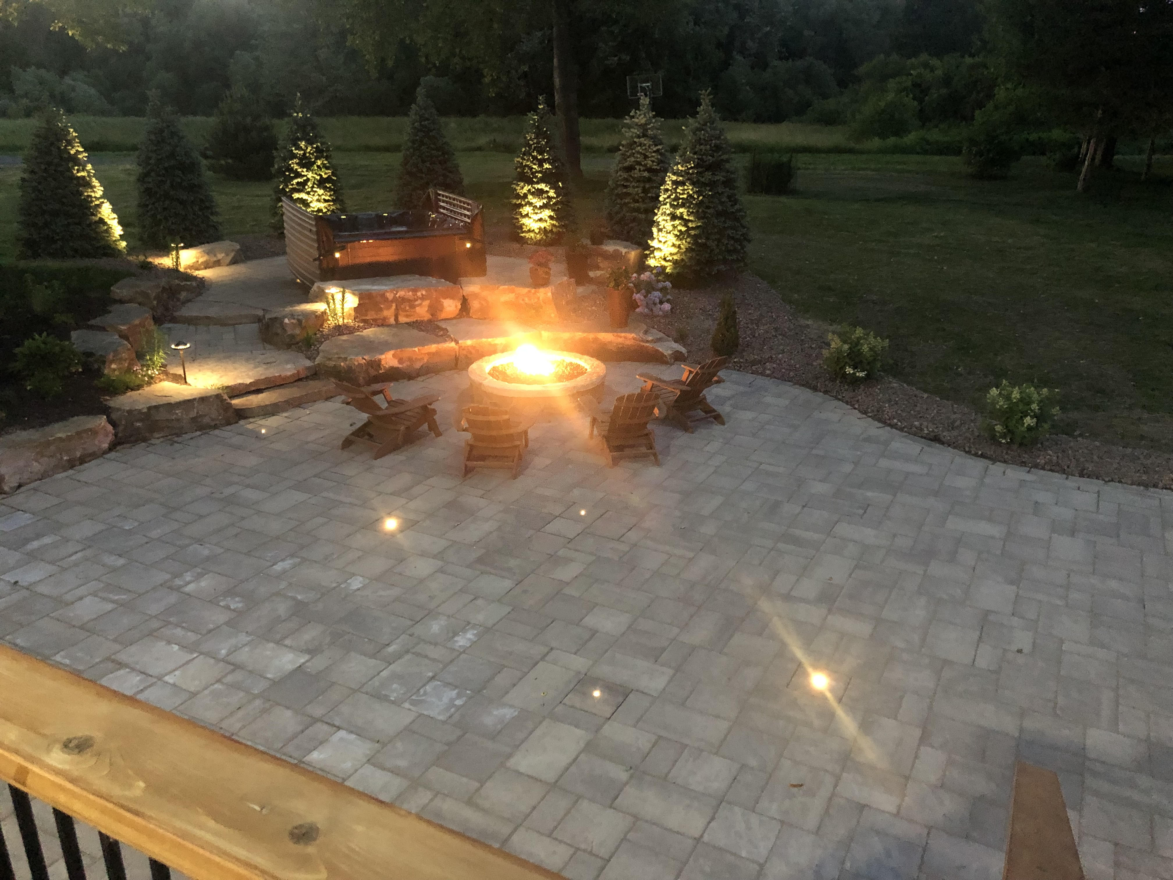 Paver Patio with Boulder Seating LED Lighting and Gas Fire Pit