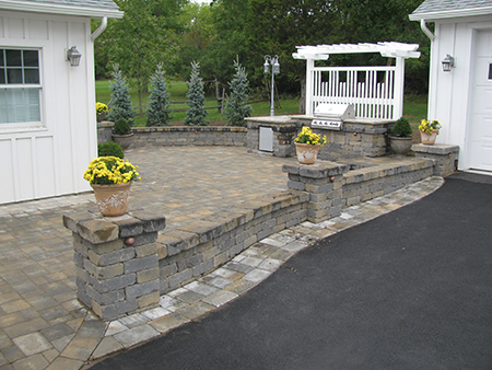 Paver Patio with Sitting Wall and Outdoor Kitchen